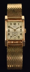 Wyler vintage 14K gold men's tank watch. Gold case and band. Antimagnetic. Swiss made movement. Band