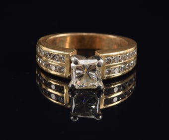 14K gold square diamond solitaire ring. Central square stone measuring 5.6 x 5.7mm (about 0.75ct)