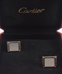 Cartier sterling silver and mother of pearl men's cufflinks. Rectangular form. Marked on reverse.