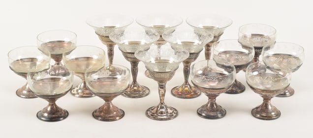 16 sterling silver ice creams with glass liners. 3 different sets; 6 tall with reticulated design, 5