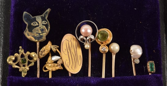 Grouping of 9 assorted vintage stick pins. To include 6 which test as at least 10K (3 pearls, green