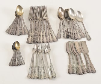 Whiting "Louis XV" 60-piece sterling silver flatware. 12 spoons with gilt bowls (5.25in), 12 butter