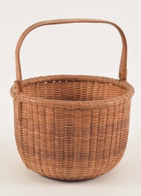 Jose Formoso Reyes mid-20th Century signed Nantucket open basket with squared swing handle. Turned