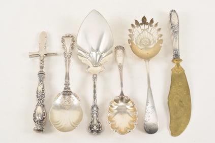 6 sterling silver utensils. To include: 1) Cigar tool, slotted spoon with etched handle, 2 spoons,