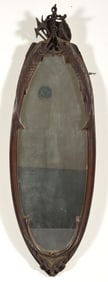 Early 20th century Plummer style carved wood mirror with marlins and anchors. 36in length.