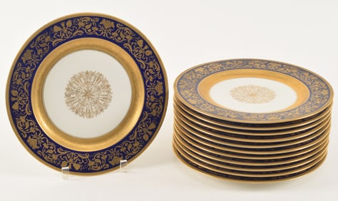 Set of 12 Black Night place plates with cobalt border and gilt decorations. 10 7/8 inch diameter