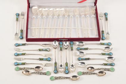 Lot of various silver flatware sets. To include:1) 5 Chinese export silver reticulated jade inset