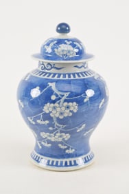 19th/20th century Chinese porcelain covered jar. Blue and white prunus decoration. 4 character mark