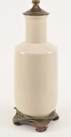 Porcelain vase. China. 19th century. Baluster form. Ivory colored finely crackled glaze. 16.5in