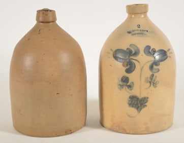 2 Antique 2 gallon stoneware jugs, one Reidinger & Caire, Po'keepsee, NY, and an undecorated jug
