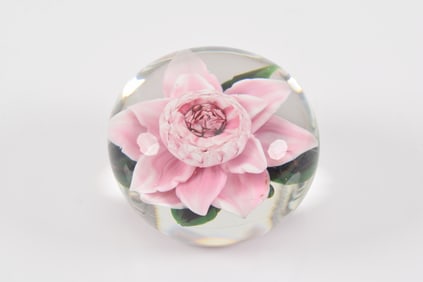 Rick Ayotte pink flower glass paperweight. Signed and numbered M-36 91. 2in diameter.