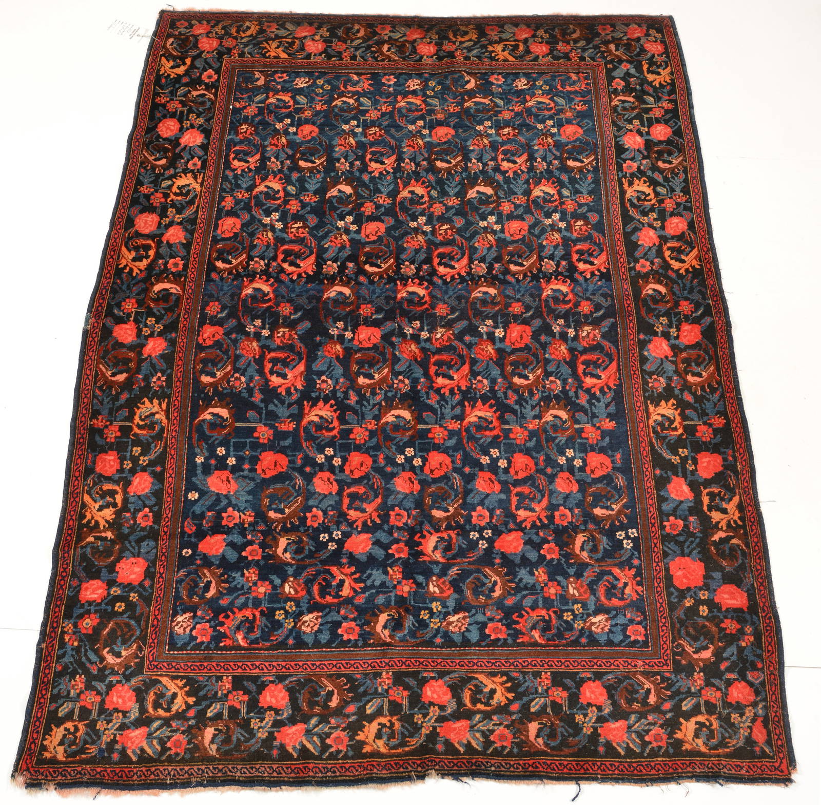 Karabagh rose pattern area rug. 75 x 56 in
