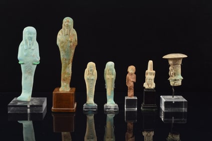 Lot of 7 faience works. Egyptian dynastic period. 5 Ushabtis and 2 others. 4.25in largest.