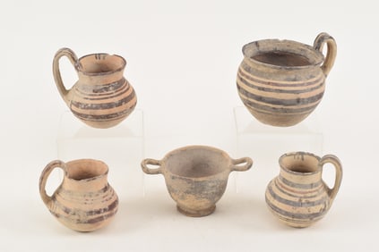 Lot of 5 pieces of ancient pottery vessels with banded decoration. Largest: 5.25in high.