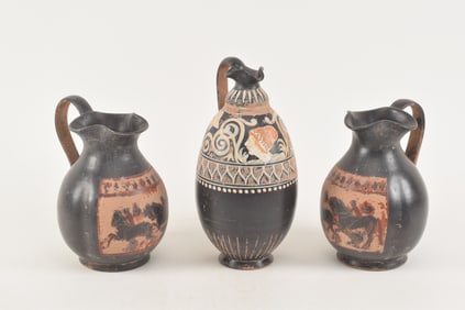 3 Grand Tour ancient style pottery wine jugs, 19th century. Pair with black animal decoration on red