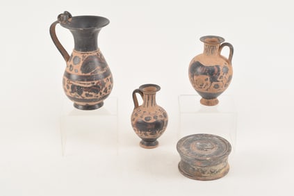 Lot of 4 Grand Tour and ancient pottery items including animal decorated wine jugs and a lidded