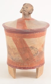 Effigy jar. Mayan. 7th century A.D. Yucatan. Slightly flaring cylindrical form with head finial. Red