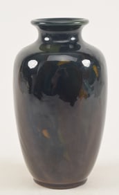 Rookwood pottery artist painted vase, ca. 1903. Decoration of blue/green and yellow flowers on a