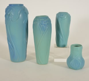 4 Van Briggle art pottery vases in blue-green glaze with incised marks on base. Two calla Lilly,