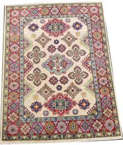 Kazak area rug with cream ground. 79 x 59