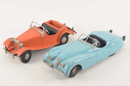 2 Doepke Model Toys cast metal cars, including a ca. 1955 Jaguar blue sports car model (scattered