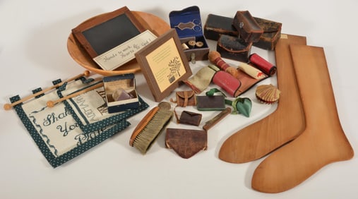 An assortment of Shaker related items, including various sewing items like leather wrapped boxes,