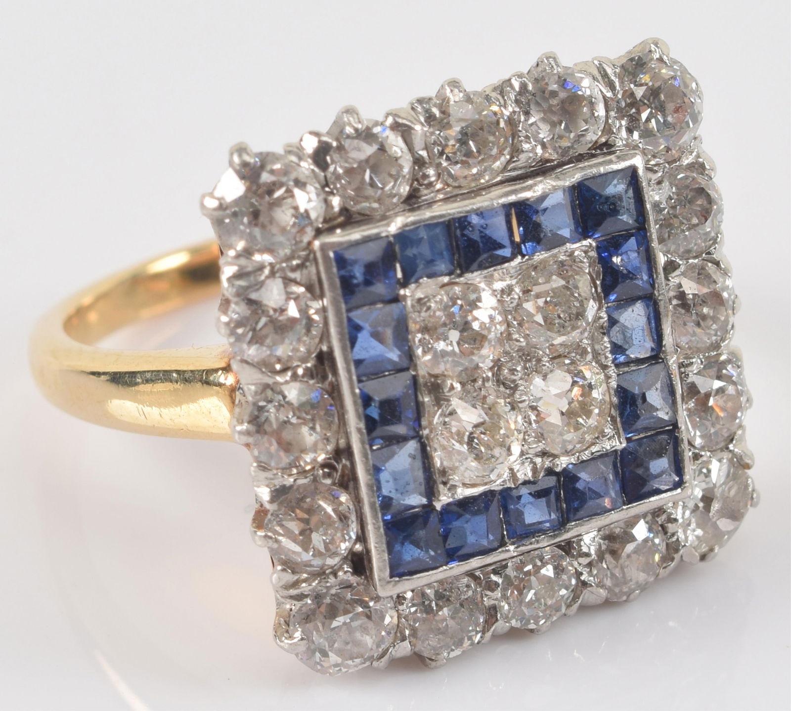 Art Deco 18K gold diamond and sapphire pave square form ring. Square design of of sapphires