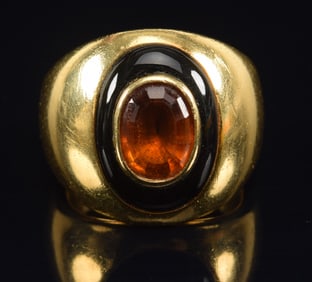 18K gold citrine heavy ring. Oval cut stone with black border, likely enamel. Unmarked. Tests as