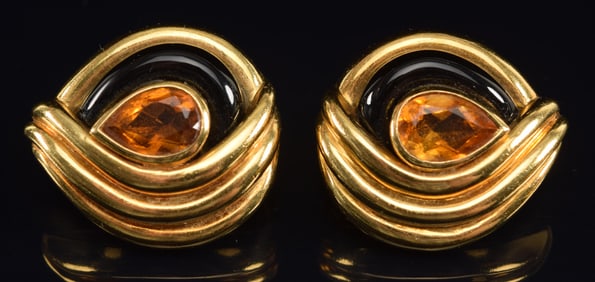 18K gold citrine mounted leaf form heavy earrings. Black enamel decoration. Hallmarked 750. 1in