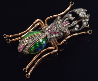 w19th century Egyptian Revival 14K gold and silver scarab brooch. Set with rubies and diamonds