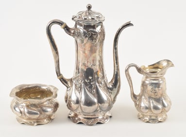 Gorham Martele style sterling silver decorated 3-piece tea set. Tall pot 11in high. Floral