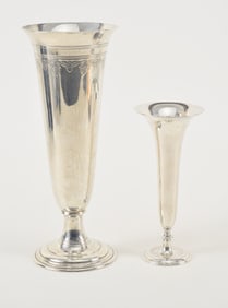 2 Tiffany & Co. makers sterling silver vases. 1) Tall vase with relief scrolling leaf decoration.