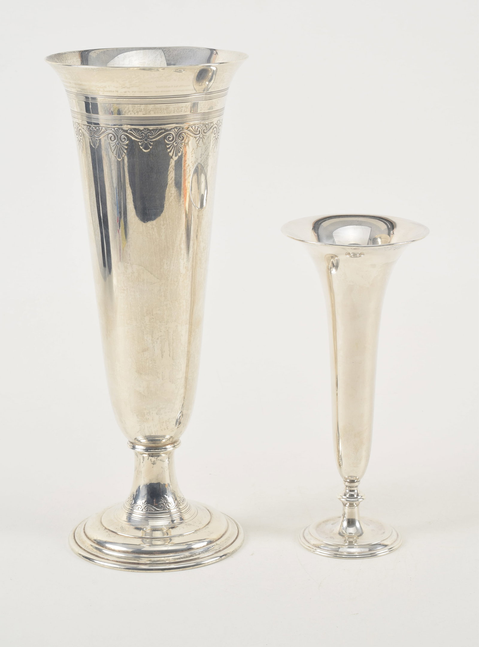 2 Tiffany & Co. makers sterling silver vases. 1) Tall vase with relief scrolling leaf decoration. (1 of 7)