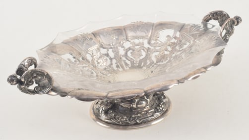 Tiffany & Co. makers sterling silver small heavy classical decorated dish. Relief figural handles