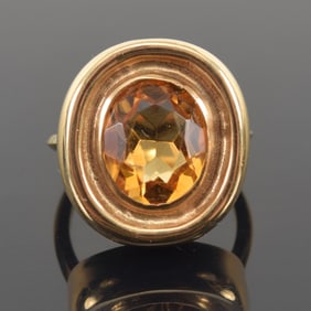 Cartier 18K gold citrine mounted ring. Stone measures approx. 12 x 10mm. Marked Cartier and 18K.