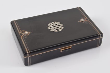 Cartier Art Deco silver and black enamel diamond mounted compact. Asian design diamond mounted