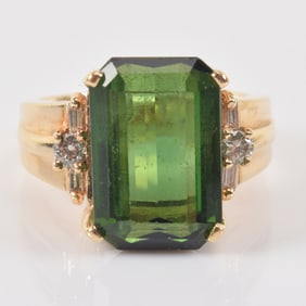 14K gold tourmaline and diamond mounted ring by Stuller. Marked. Stone 14.3mm long. Ring size 6.25.