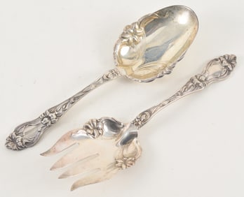 Frank Whiting sterling silver salad set with floral decoration. 7.1 ozt. 8.9in long.