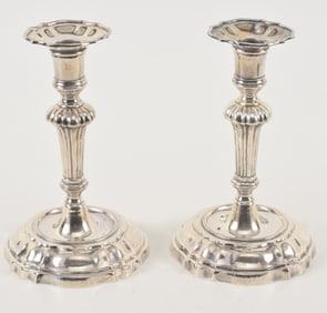 Buccellati pair of heavy sterling silver candlesticks. Petal form tops. Marked on base rim. 35.5