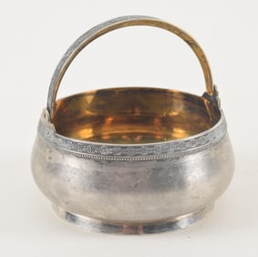 Russian silver swing handled basket dish. Marked on base with 875 mark. Marked on handle also.