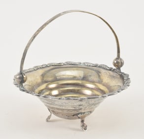 Russian silver swing handle basket footed dish. Marked under top rim and handle. 5.1 ozt. 5.5in