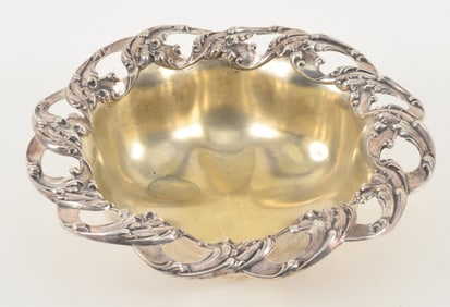 Gorham sterling silver bowl with pierced relief bellflower decoration. Gilt interior. 20.7 ozt. 11in
