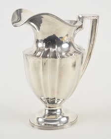 Sterling silver water pitcher with paneled decoration. Unicorn silver maker's mark. 27.7 ozt.