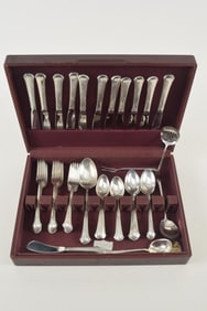 55 Pieces Towle Chippendale pattern partial sterling silver flatware service. Including 11 hollow
