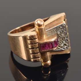 Retro 18K gold ruby and diamond ring. Ring size: 4.25. Marked 750 and indiscernible maker's mark. 9