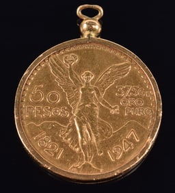 1947 Mexican 50 pesos gold coin. Gold pendant mounts. Wear and slight dings to frame. Coin