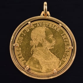 1915 Austrian 4 ducat gold coin mounted as a pendant. Loop marked 750. 45.7mm diameter. 20.1 grams.