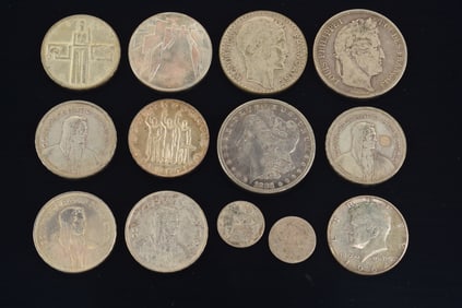 Lot of American and European silver coins. To include: 1883 Morgan silver dollar, 1833 Louis