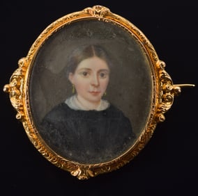 19th century miniature portrait in 14K gold frame. Portrait painting of a woman in black dress