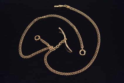 Antique 14K gold watch chain. 20.5in length. Each clasp marked 14K, mark on plaque in links ("1918",